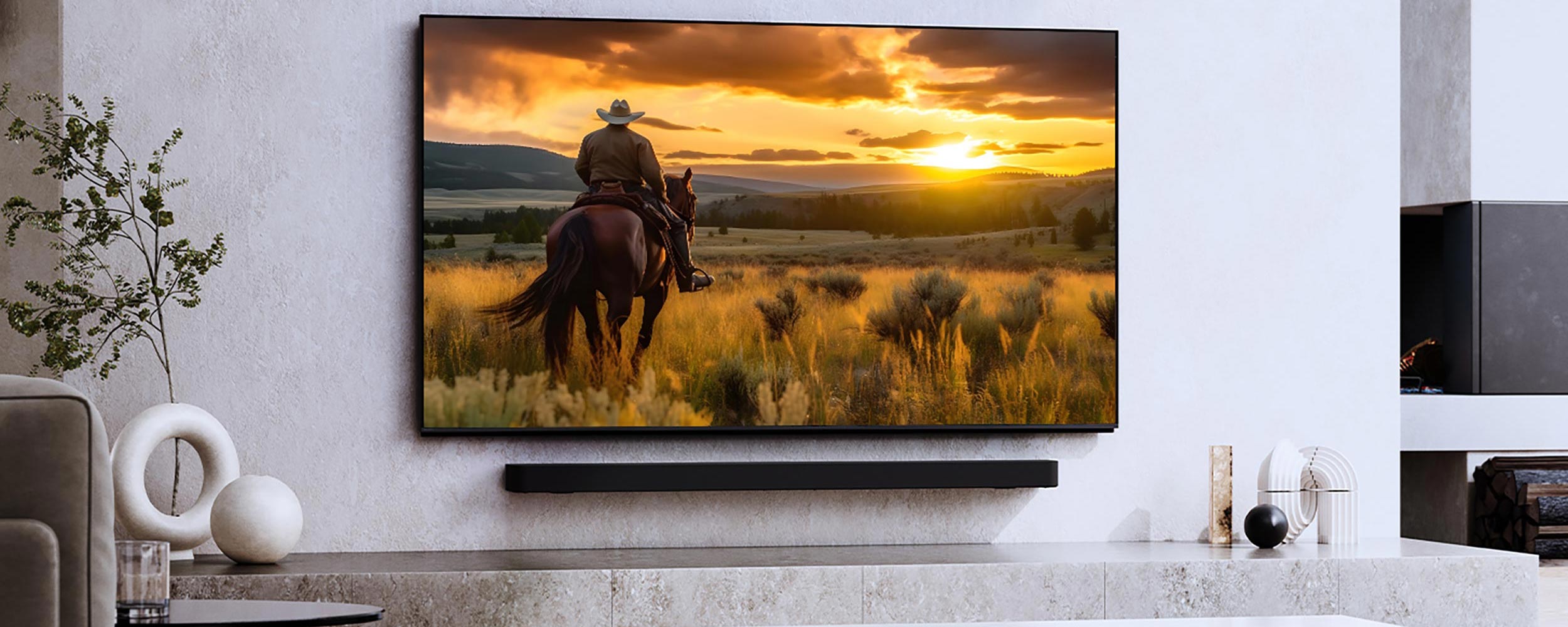 A wall-mounted TV displaying a serene landscape in a contemporary living room.